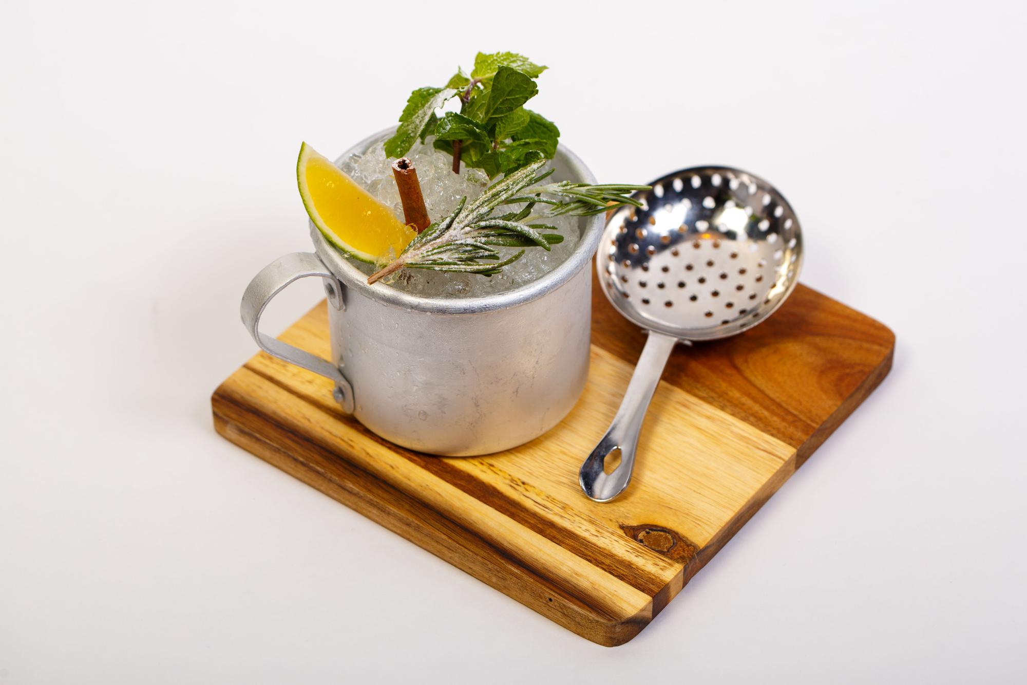 Cozy studio corner with herbs and cookware